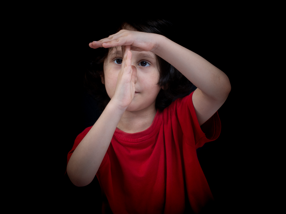 Child making a gesture